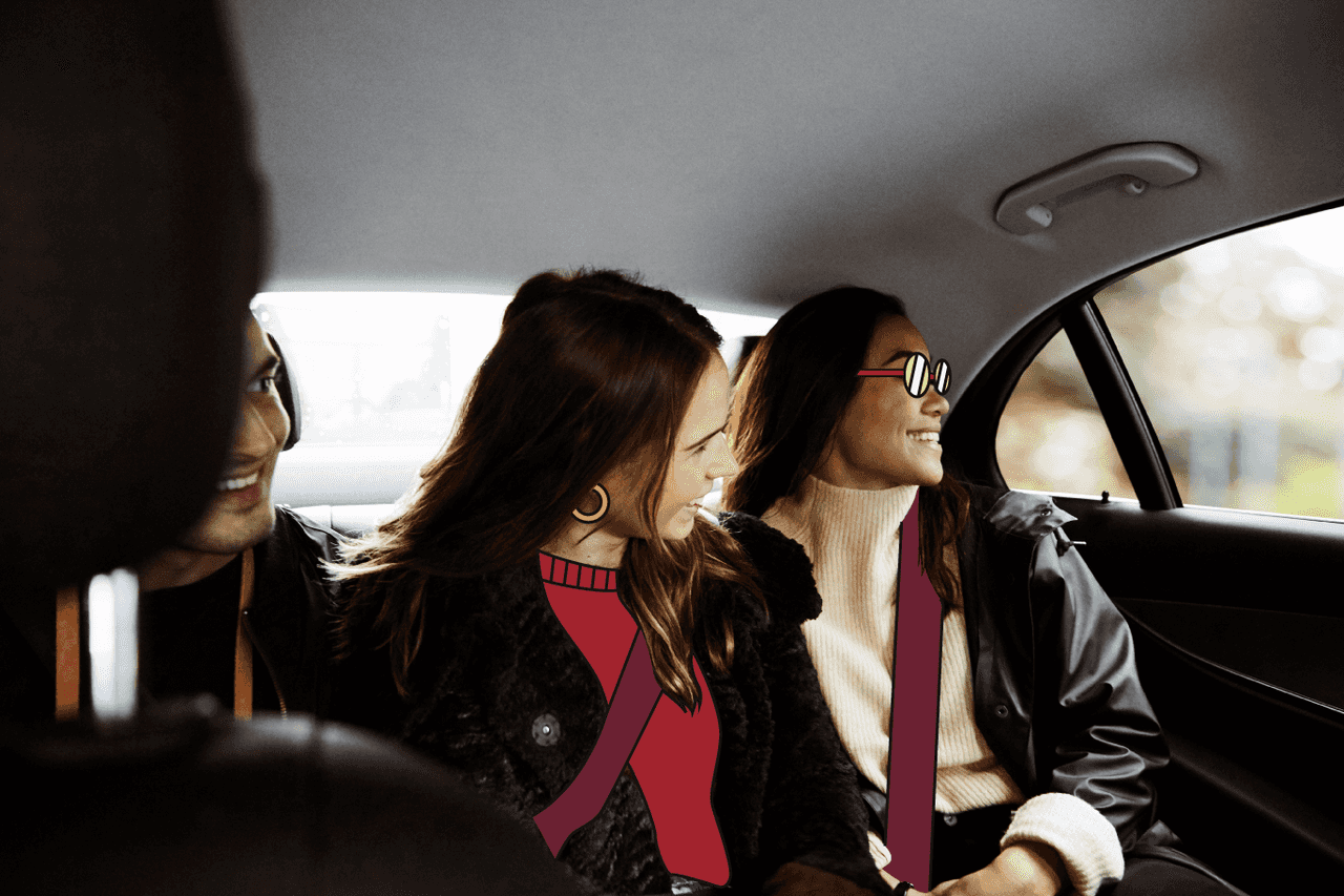 Viajeros de negocios cogen un business taxi en Madrid para asistir a un evento de empresa