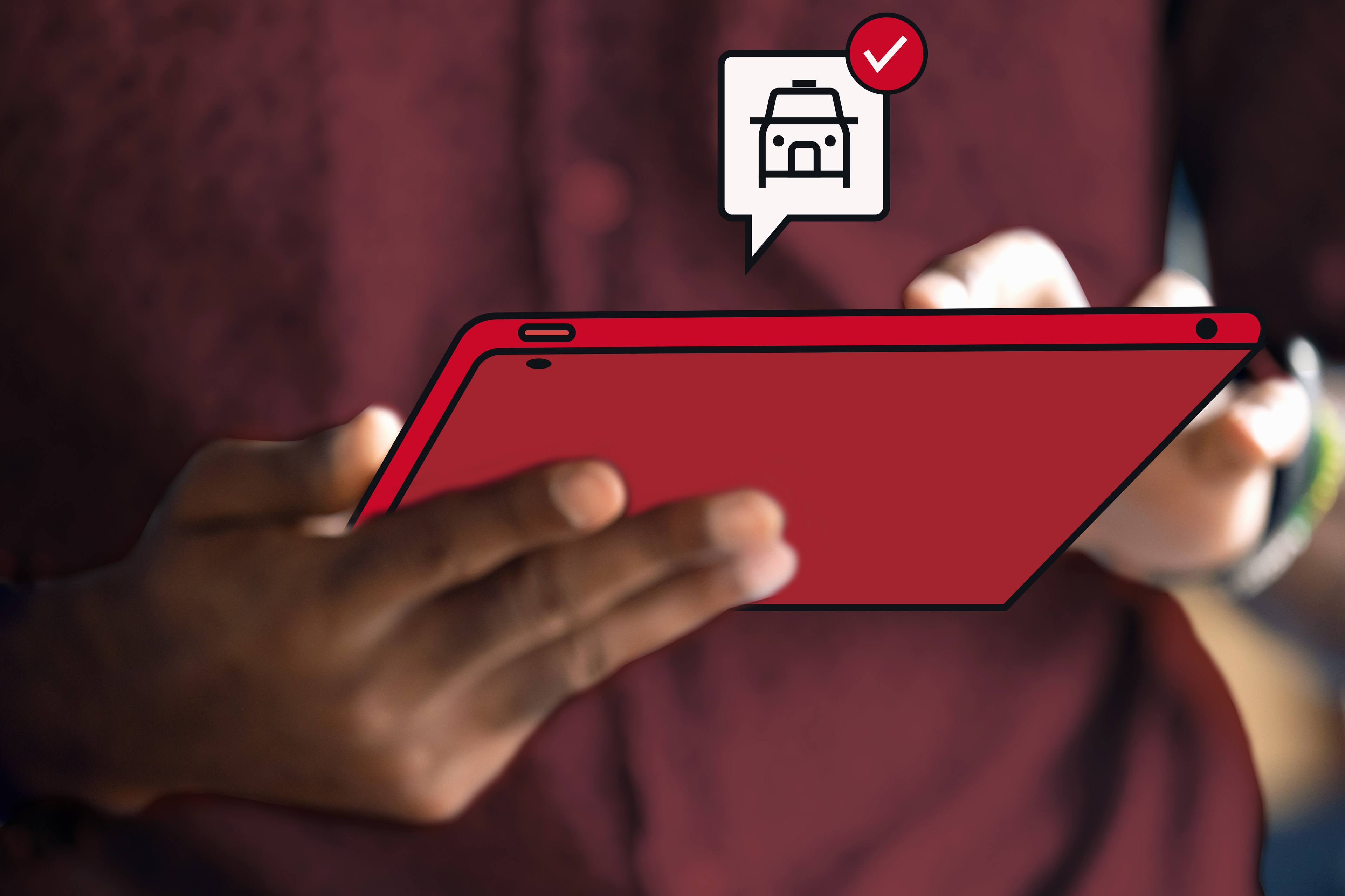 Una persona maneja su tablet con un icono de un taxi